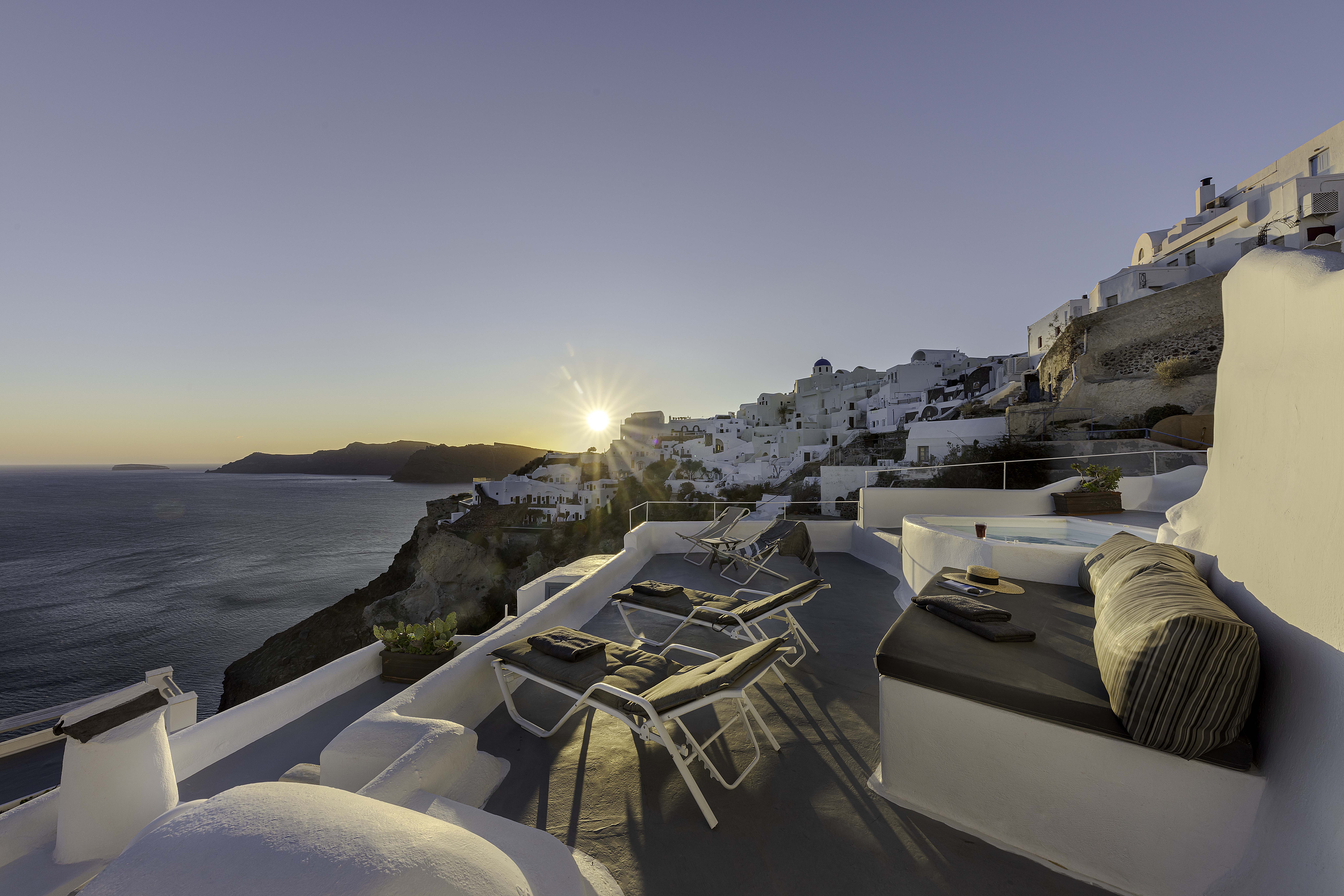 Sunset from Skala terrace overlooking the caldera